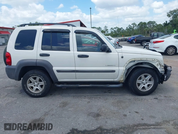 2004 Jeep Liberty Sport with VIN 1J4GK48K54W153217, listed as a IAAI auction lot 42071897 with 106,921 mi miles and . Bid and sale history available at carsss.com. Image 14.