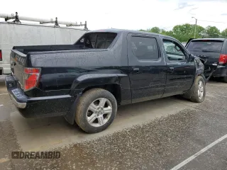 2012 Honda Ridgeline RTL z VIN 5FPYK1F5XCB455246, wystawiony jako Copart lot #52871925 z przebiegiem 179 755 mil mil oraz Szkody całkowita. Historia ofert i sprzedaży dostępna na DreamBid. Obrazek 3.