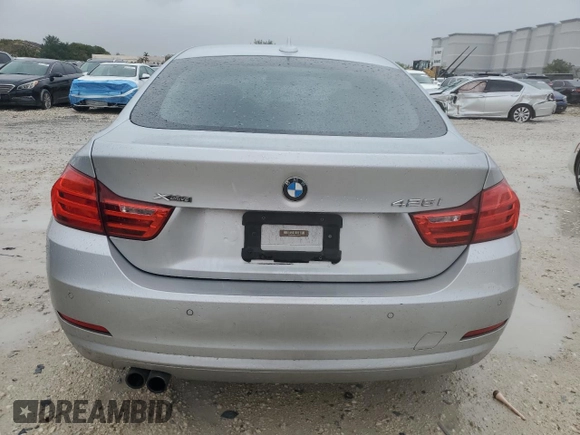 2015 BMW 4 Series 428i xDrive с VIN WBA4C9C59FD330853, выставлен на аукционе Copart как лот 52130785 с пробегом 128 618 миль миль и Списание • Salvage title. История ставок и продаж доступна на DreamBid. Изображение 6.