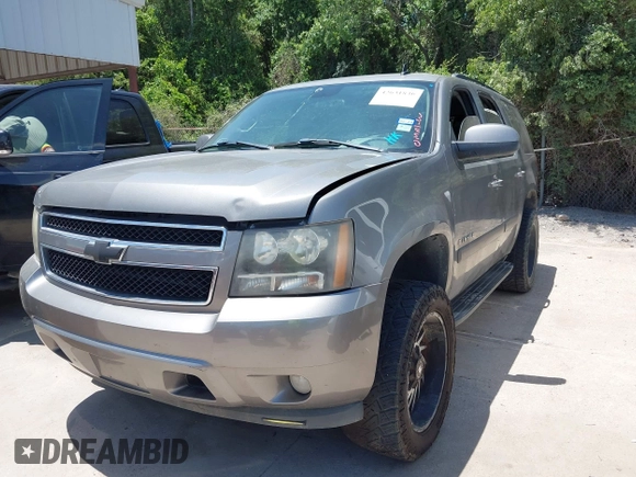 2007 Chevrolet Tahoe LT with VIN 1GNFC13007J405418, listed as a IAAI auction lot 42631830 with 225,156 mi miles and . Bid and sale history available at DreamBid. Image 2.