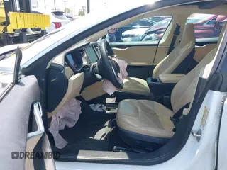 2014 Tesla Model S 60 с VIN 5YJSA1H17EFP40534, выставлен на аукционе IAAI как лот 42346697 с пробегом 203 166 миль миль и . История ставок и продаж доступна на DreamBid. Изображение 5.