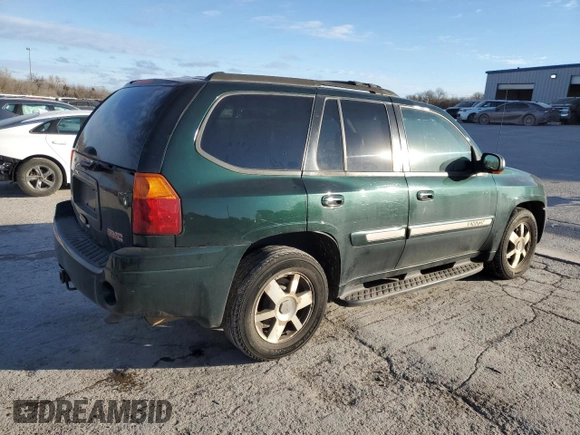 2004 GMC Envoy SLE with VIN 1GKDT13S142197514, listed as a Copart auction lot 89014465 with 202,790 mi miles and Salvage Title. Bid and sale history available at carsss.com. Image 3.