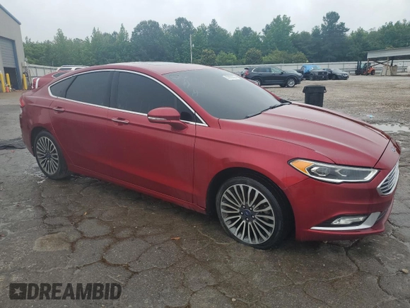 2017 Ford Fusion SE z VIN 3FA6P0HD1HR262320, wystawiony jako Copart lot #55850095 z przebiegiem 129 244 mil mil oraz Czysty tytuł • Clean title. Historia ofert i sprzedaży dostępna na DreamBid. Obrazek 4.