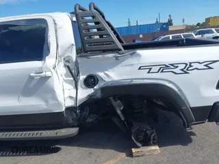 2021 Ram 1500 TRX with VIN 1C6SRFU9XMN905260, listed as a IAAI auction lot 41745910 with 69,565 mi miles and . Bid and sale history available at DreamBid. Image 6.