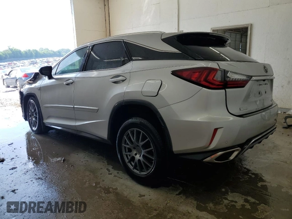 2016 Lexus RX 350 with VIN 2T2BZMCA1GC032722, listed as a Copart auction lot 59550625 with 124,611 mi miles and Salvage title. Bid and sale history available at DreamBid. Image 2.