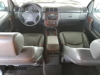 1999 Mercedes-Benz M 320/430/500 with VIN 4JGAB54E9XA130876, listed as a Copart auction lot 51714835 with 191,810 mi miles and Salvage Title. Bid and sale history available at DreamBid. Image 8.