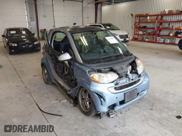 2011 Smart fortwo Pure z VIN WMEEJ3BA9BK432217, wystawiony jako IAAI lot #42145887 z przebiegiem 135 480 mil mil oraz . Historia ofert i sprzedaży dostępna na DreamBid. Obrazek 6.