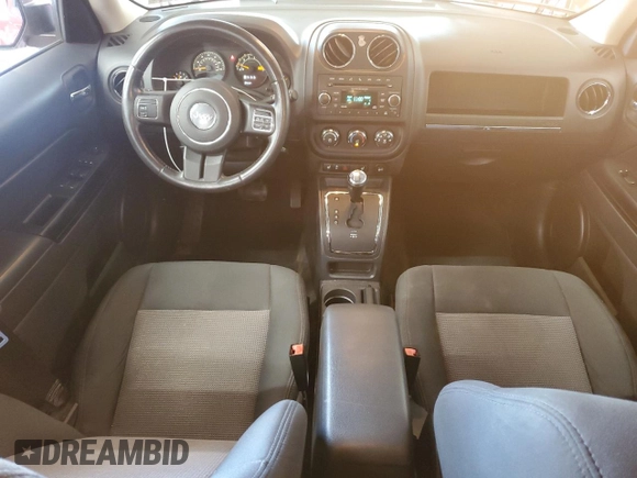 2014 Jeep Patriot Latitude with VIN 1C4NJRFB2ED734624, listed as a Copart auction lot 60675175 with 91,624 mi miles and Salvage title. Bid and sale history available at DreamBid. Image 8.