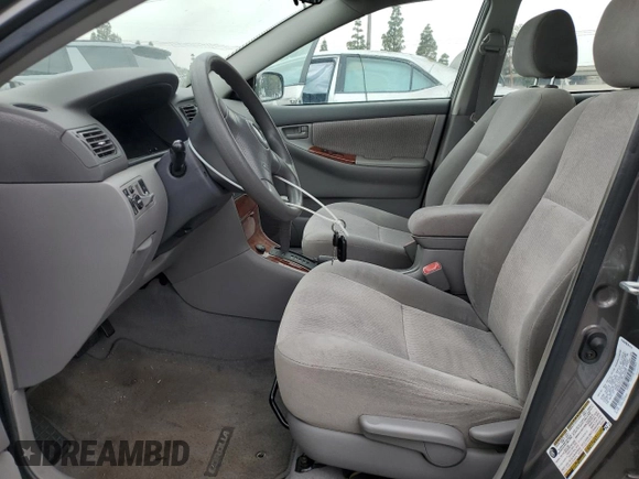 2005 Toyota Corolla CE with VIN 1NXBR32EX5Z403620, listed as a Copart auction lot 58641705 with 38,270 mi miles and Salvage title. Bid and sale history available at DreamBid. Image 7.