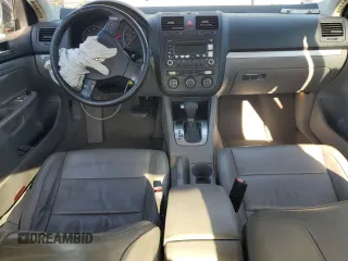 2006 Volkswagen Jetta z VIN 3VWDG71K26M673879, wystawiony jako Copart lot #75674634 z przebiegiem 93 689 mil mil oraz Szkoda całkowita • Salvage title. Historia ofert i sprzedaży dostępna na DreamBid. Obrazek 8.