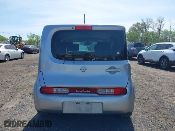 2011 Nissan Cube S z VIN JN8AZ2KR1BT205110, wystawiony jako IAAI lot #42152109 z przebiegiem 92 493 mil mil oraz . Historia ofert i sprzedaży dostępna na DreamBid. Obrazek 15.