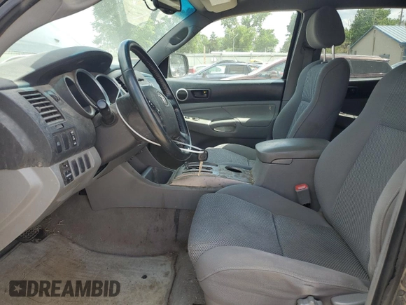 2005 Toyota Tacoma with VIN 5TEMU52N55Z018383, listed as a Copart auction lot 61807995 with 352,755 mi miles and Salvage title. Bid and sale history available at DreamBid. Image 7.