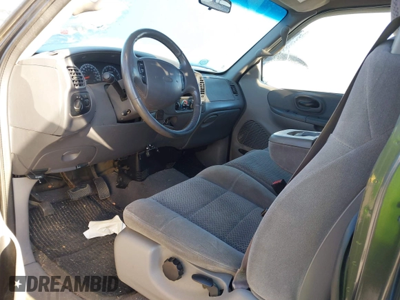 2002 Ford F-150 XL with VIN 1FTRX17L52NA85965, listed as a IAAI auction lot 41796633 with 171,814 mi miles. Bid and sale history available at carsss.com. Image 5.
