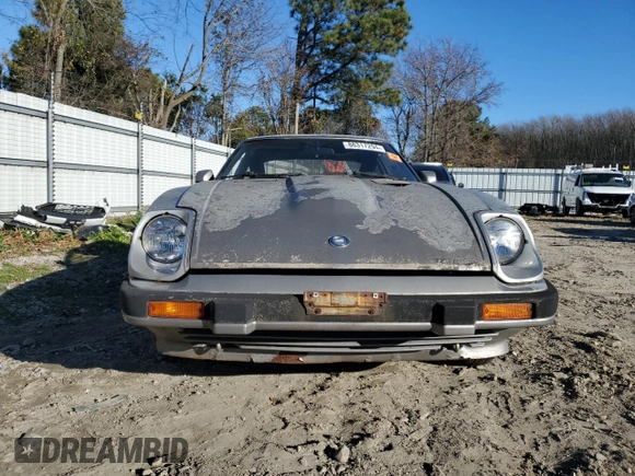 1983 Datsun 280ZX z VIN JN1HZ04S6DX571982, wystawiony jako Copart lot #86317294 z przebiegiem Nie podano mil oraz Tytuł czysty. Historia ofert i sprzedaży dostępna na DreamBid. Obrazek 5.
