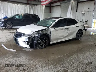 2018 Toyota Camry LE с VIN 4T1B11HKXJU151838, выставлен на аукционе Copart как лот 59203215 с пробегом 64 730 миль миль и Списание • Salvage title. История ставок и продаж доступна на DreamBid. Изображение 1.