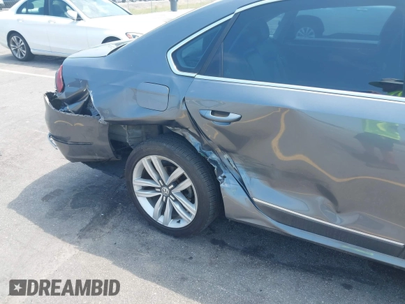 2017 Volkswagen Passat SE with VIN 1VWGT7A33HC058764, listed as a IAAI auction lot 42668036 with 76,732 mi miles and . Bid and sale history available at DreamBid. Image 6.