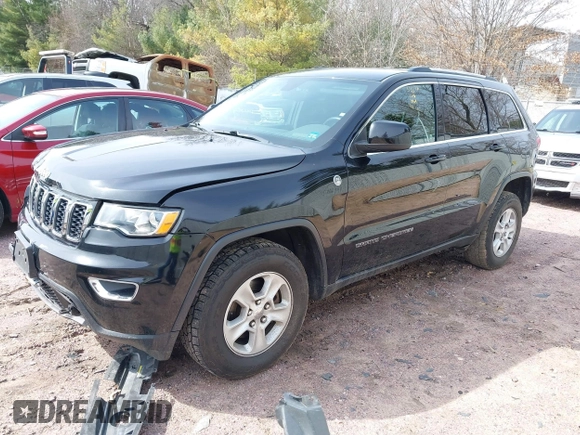 2017 Jeep Grand Cherokee Laredo with VIN 1C4RJFAGXHC863904, listed as a IAAI auction lot 41914465 with 122,981 mi miles. Bid and sale history available at carsss.com. Image 2.
