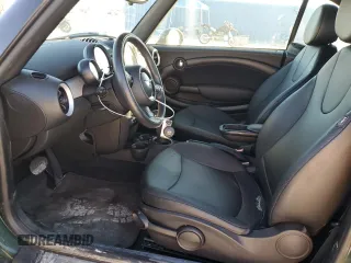2015 MINI Convertible z VIN WMWZN3C5XFT861708, wystawiony jako Copart lot #82233054 z przebiegiem 38 498 mil mil oraz Czysty tytuł • Clean title. Historia ofert i sprzedaży dostępna na DreamBid. Obrazek 7.