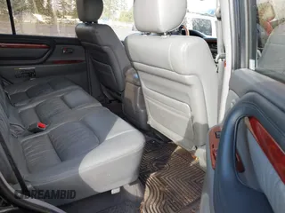 2001 Lexus LX 470 with VIN JTJHT00W613500563, listed as a IAAI auction lot 41730804 with 232,647 mi miles and . Bid and sale history available at carsss.com. Image 8.