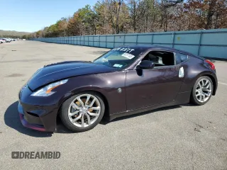 2014 Nissan 370Z Touring with VIN JN1AZ4EH6EM633637, listed as a Copart auction lot 50797105 with 0 mi miles and Salvage Title. Bid and sale history available at carsss.com. Image 1.