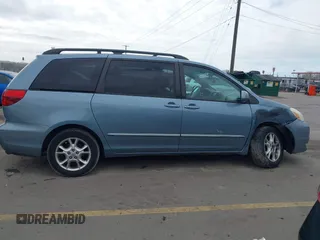 2005 Toyota Sienna XLE with VIN 5TDBA22CX5S039921, listed as a IAAI auction lot 41812339 with 245,111 mi miles and . Bid and sale history available at DreamBid. Image 13.