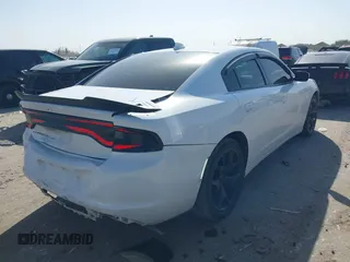 2015 Dodge Charger SXT with VIN 2C3CDXHG8FH725446, listed as a IAAI auction lot 41742400 with 84,579 mi miles and . Bid and sale history available at DreamBid. Image 4.