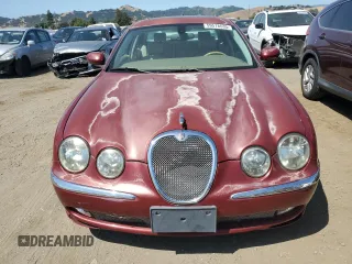 2003 Jaguar S-Type z VIN SAJEA01U13HM90556, wystawiony jako Copart lot #59578535 z przebiegiem 50 723 mil mil oraz Czysty tytuł • Clean title. Historia ofert i sprzedaży dostępna na DreamBid. Obrazek 5.