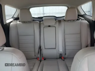 2015 Ford Escape Titanium z VIN 1FMCU0J97FUA14845, wystawiony jako Copart lot #58911445 z przebiegiem 110 437 mil mil oraz Szkoda całkowita • Salvage title. Historia ofert i sprzedaży dostępna na DreamBid. Obrazek 10.