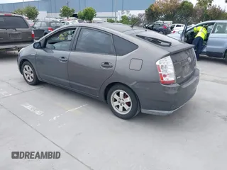 2007 Toyota Prius z VIN JTDKB20U573236900, wystawiony jako IAAI lot #42375325 z przebiegiem Nie podano mil oraz . Historia ofert i sprzedaży dostępna na DreamBid. Obrazek 3.