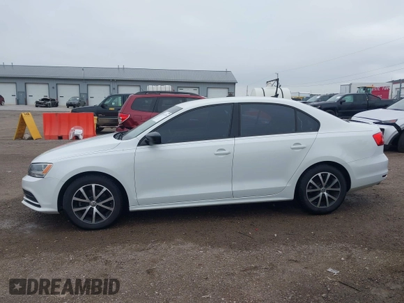 2015 Volkswagen Jetta Sedan 1.8T SE with VIN 3VWD17AJ4FM350619, listed as a IAAI auction lot 41917719 with 135,561 mi miles. Bid and sale history available at carsss.com. Image 14.