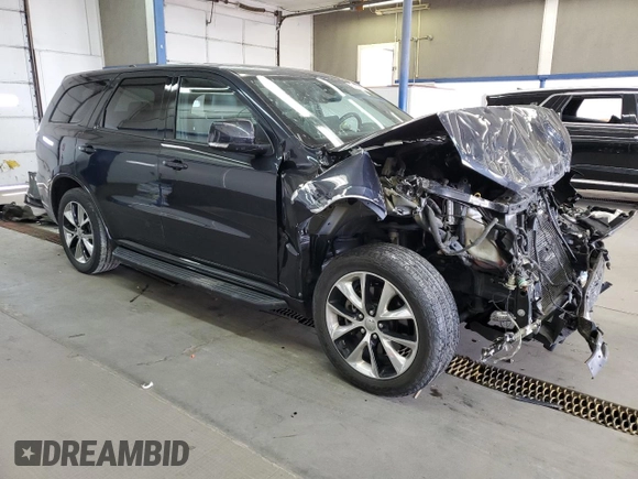 2015 Dodge Durango R/T with VIN 1C4SDJCT8FC772312, listed as a Copart auction lot 56235075 with 61,813 mi miles and Salvage title. Bid and sale history available at DreamBid. Image 4.