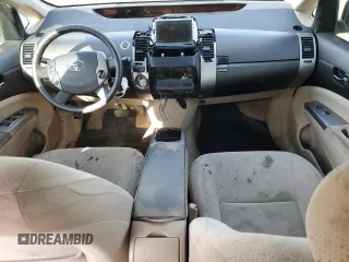 2005 Toyota Prius z VIN JTDKB20U753032936, wystawiony jako Copart lot #52772755 z przebiegiem 144 551 mil mil oraz Czysty tytuł • Clean title. Historia ofert i sprzedaży dostępna na DreamBid. Obrazek 8.