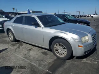 2009 Chrysler 300 LX with VIN 2C3KA43D49H632282, listed as a Copart auction lot 56073165 with 167,346 mi miles and Clean title. Bid and sale history available at DreamBid. Image 4.