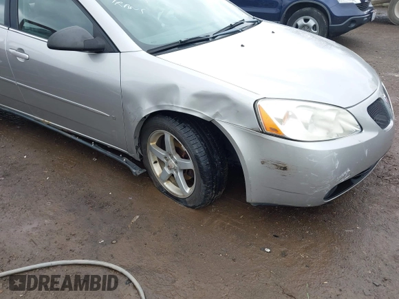 2006 Pontiac G6 6-Cyl with VIN 1G2ZG558464289212, listed as a IAAI auction lot 41994843 with 126,502 mi miles. Bid and sale history available at carsss.com. Image 6.