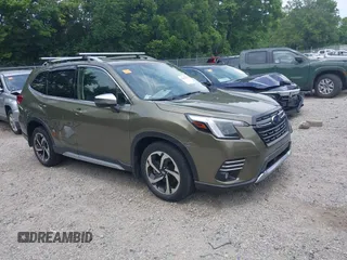 2023 Subaru Forester Touring with VIN JF2SKARC6PH400678, listed as a IAAI auction lot 42694547 with 14,484 mi miles and . Bid and sale history available at DreamBid. Image 1.