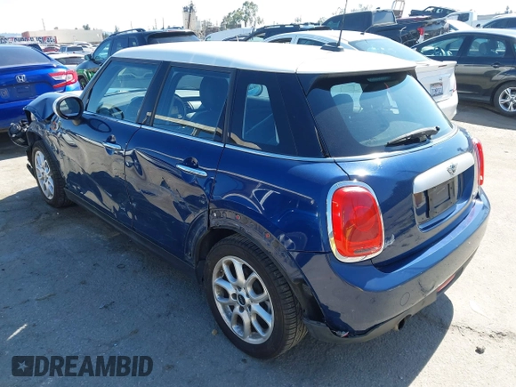 2015 MINI Hardtop 4 Door with VIN WMWXS5C50FT832438, listed as a IAAI auction lot 42632469 with 96,432 mi miles and . Bid and sale history available at DreamBid. Image 3.