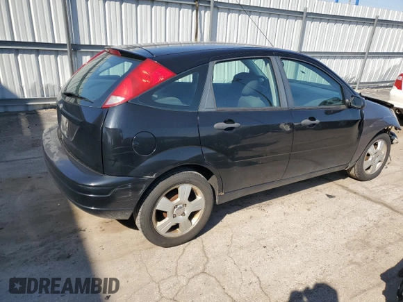 2007 Ford Focus S z VIN 1FAHP37N07W161088, wystawiony jako Copart lot #54140415 z przebiegiem 241 367 mil mil oraz Szkoda całkowita • Salvage title. Historia ofert i sprzedaży dostępna na DreamBid. Obrazek 3.