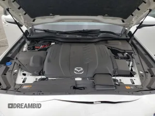 2024 Mazda CX-90 Select z VIN JM3KKAHD5R1187895, wystawiony jako Copart lot #53903385 z przebiegiem 4 639 mil mil oraz Szkoda całkowita • Salvage title. Historia ofert i sprzedaży dostępna na DreamBid. Obrazek 12.