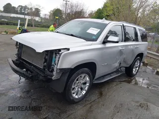 2015 GMC Yukon SLT with VIN 1GKS2BKC0FR676107, listed as a IAAI auction lot 41962929 with 132,389 mi miles. Bid and sale history available at carsss.com. Image 2.