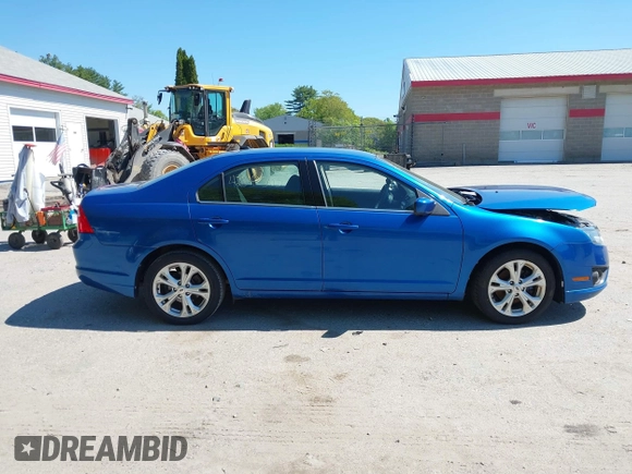2012 Ford Fusion SE z VIN 3FAHP0HG4CR276627, wystawiony jako IAAI lot #42348303 z przebiegiem 160 922 mil mil oraz . Historia ofert i sprzedaży dostępna na DreamBid. Obrazek 14.