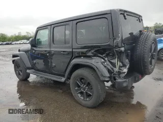 2022 Jeep Wrangler Unlimited Sahara with VIN 1C4HJXEGXNW211886, listed as a Copart auction lot 54877645 with 64,815 mi miles and Salvage title. Bid and sale history available at DreamBid. Image 2.