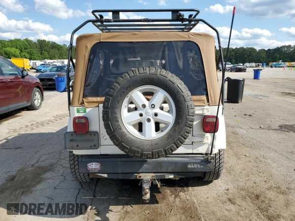 2000 Jeep Wrangler Sahara with VIN 1J4FA59S8YP721771, listed as a Copart auction lot 56924475 with 175,456 mi miles and Clean title. Bid and sale history available at DreamBid. Image 6.