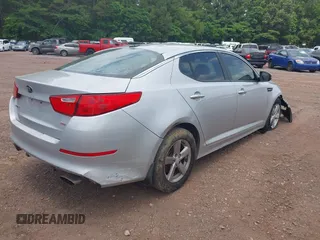 2015 Kia Optima LX z VIN 5XXGM4A70FG385024, wystawiony jako IAAI lot #42256238 z przebiegiem 162 395 mil mil oraz . Historia ofert i sprzedaży dostępna na DreamBid. Obrazek 4.