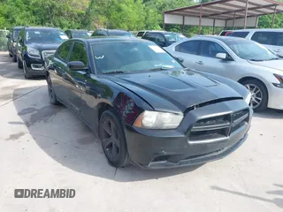 2014 Dodge Charger SE with VIN 2C3CDXBG9EH329419, listed as a IAAI auction lot 42025607 with 166,875 mi miles. Bid and sale history available at carsss.com. Image 1.