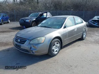 2002 Nissan Altima S with VIN 1N4AL11D92C256180, listed as a IAAI auction lot 41880101 with 112,228 mi miles. Bid and sale history available at carsss.com. Image 12.