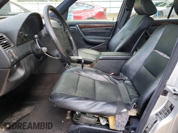 1999 Mercedes-Benz C 230/260/280/320 with VIN WDBHA24G4XA749633, listed as a Copart auction lot 56560105 with 221,306 mi miles and Salvage title. Bid and sale history available at DreamBid. Image 7.