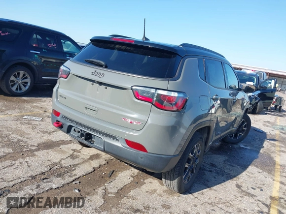 2019 Jeep Compass Trailhawk with VIN 3C4NJDDB2KT716281, listed as a IAAI auction lot 41840458 with 89,246 mi miles and . Bid and sale history available at DreamBid. Image 4.