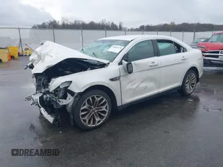 2014 Ford Taurus Limited with VIN 1FAHP2F80EG183153, listed as a IAAI auction lot 40860378 with 163,294 mi miles. Bid and sale history available at carsss.com. Image 19.