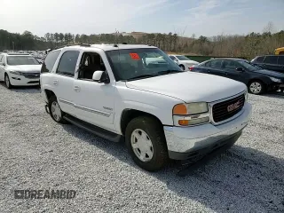 2005 GMC Yukon SLT z VIN 1GKEC13T25R136033, wystawiony jako Copart lot #48189995 z przebiegiem Nie podano mil oraz Szkoda całkowita • Salvage title. Historia ofert i sprzedaży dostępna na DreamBid. Obrazek 12.