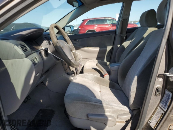 2007 Toyota Corolla CE with VIN 1NXBR32EX7Z916711, listed as a Copart auction lot 52150535 with 250,438 mi miles and Salvage Title. Bid and sale history available at DreamBid. Image 7.